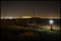 Marsh by night with office building in distance, Alviso. San Jose, California, USA (color)
