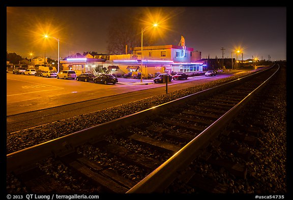 Railroad tracks and restaurant at night, Alviso. San Jose, California, USA