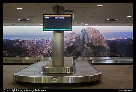 Baggage claim area and Half-Dome mural, Fresno Yosemite Airport. California, USA