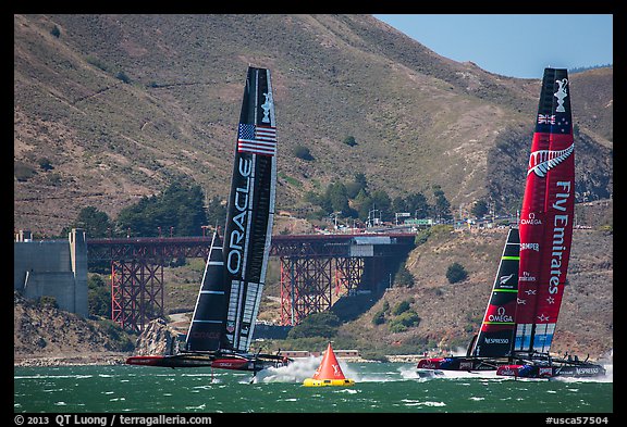 Emirates Team New Zealand leeward of Oracle Team USA at first mark. San Francisco, California, USA (color)