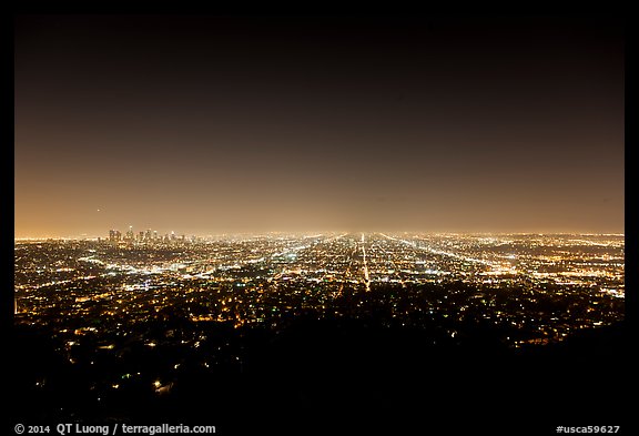 Lights of street grid and downtown at night from Griffith Park. Los Angeles, California, USA (color)