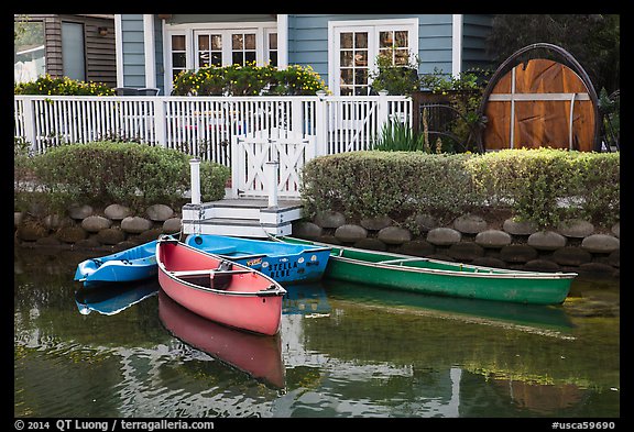 Rowboats in front of house, Venice Canal Historic District. Venice, Los Angeles, California, USA (color)