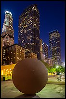 Spherical sculpture and skyscrappers at night, Pershing Square. Los Angeles, California, USA ( color)