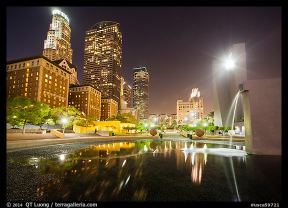 Fountain and skyscrappers at night, Pershing Square. Los Angeles, California, USA (color)