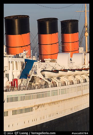 Queen Mary side and smokestacks at sunrise. Long Beach, Los Angeles, California, USA (color)