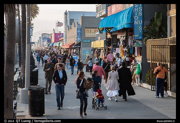 People stroll on Ocean Front Walk. Venice, Los Angeles, California, USA (color)