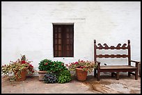 Potted plants, bench and wall, Historic Paseo. Santa Barbara, California, USA ( color)