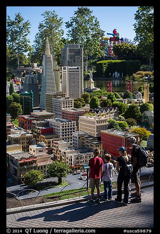 Familly looks at San Francisco built from legos, Legoland, Carlsbad. California, USA (color)