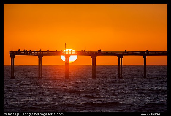 Sun setting behind Ocean Beach Pier. San Diego, California, USA