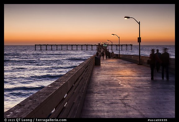 Walking on Ocean Beach Pier after sunset. San Diego, California, USA (color)