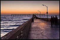 Walking on Ocean Beach Pier after sunset. San Diego, California, USA ( color)