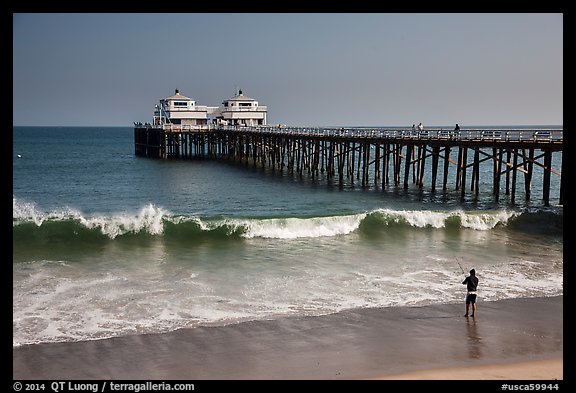 Man fishing next to Malibu Pier. Los Angeles, California, USA (color)