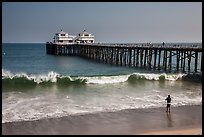 Man fishing next to Malibu Pier. Los Angeles, California, USA ( color)