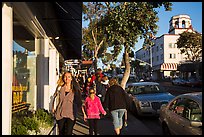 Visitors walk on sidewalk in shopping area. Laguna Beach, Orange County, California, USA ( color)