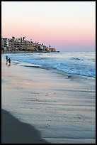 Beach at sunset with children playing. Laguna Beach, Orange County, California, USA ( color)