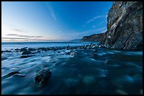 Creek, boulders, cliff, and ocean at dusk. Big Sur, California, USA ( color)