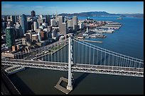 Aerial view of Bay Bridge, downtown, and piers. San Francisco, California, USA ( color)
