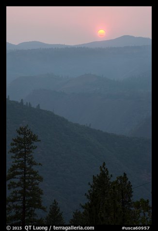Sun setting over ridges, Stanislaus National Forest. California, USA