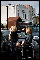 Makeup artist working on the street. Petaluma, California, USA ( color)
