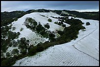 Aerial view of Evergreen Hills covered by hail. San Jose, California, USA ( color)