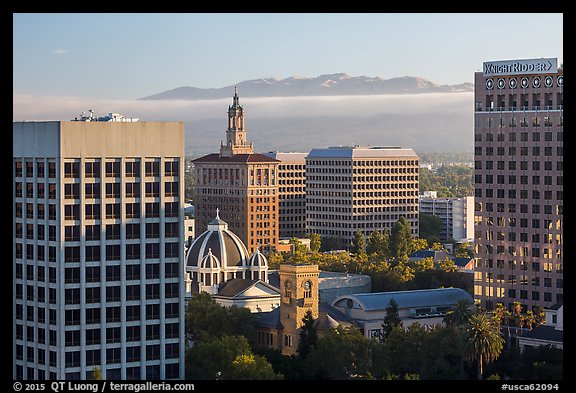 Downtown San Jose with early morning fog over hills. San Jose, California, USA (color)