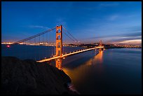 Golden Gate Bridge and city from Battery Spencer, dusk. San Francisco, California, USA ( color)