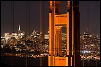 Golden Gate Bridge pillar and San Francisco skyline at night. San Francisco, California, USA ( color)