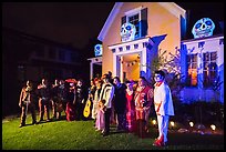 Family and guests pose in Halloween costumes. Petaluma, California, USA ( color)