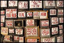 Wall of televisions covered with slogans, Slab City. Nyland, California, USA ( color)