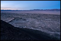 Lava field and mountains from Amboy Crater at dusk. Mojave Trails National Monument, California, USA ( color)