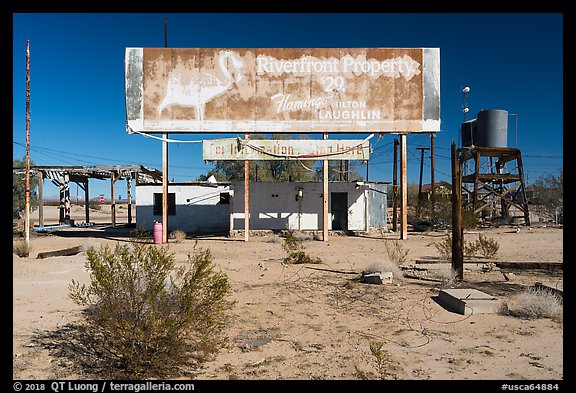 Old billboard and abandonned gas station. Mojave Trails National Monument, California, USA