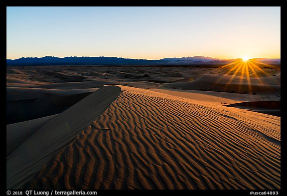 Sun setting over Cadiz Sand Dunes. Mojave Trails National Monument, California, USA