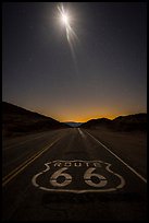 Route 66 marking and moon at night. Mojave Trails National Monument, California, USA ( color)