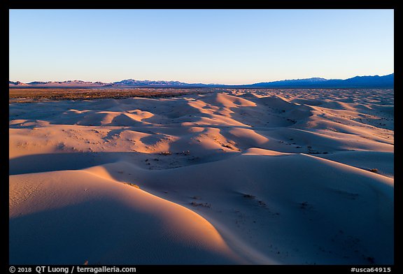 Aerial view of Cadiz dunes and mountains at sunset. Mojave Trails National Monument, California, USA
