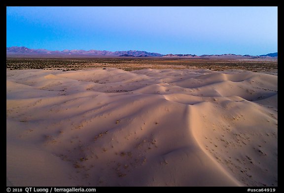 Aerial view of sand dunes and mountains at dusk, Cadiz Dunes. Mojave Trails National Monument, California, USA