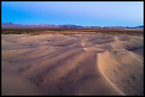 Aerial view of sand dunes and mountains at dusk, Cadiz Dunes. Mojave Trails National Monument, California, USA ( color)