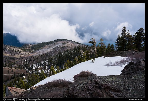 Snow patch and storm cloud near Snow Mountain summit. Berryessa Snow Mountain National Monument, California, USA