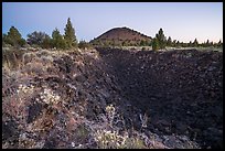 Lava depression and Schonchin Butte, dawn. Lava Beds National Monument, California, USA ( color)