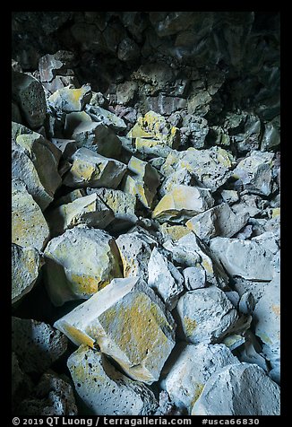 Colored rocks from collapsed ceilling, Big Painted Cave. Lava Beds National Monument, California, USA (color)