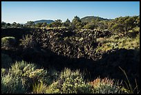 Lava depression and distant buttes. Lava Beds National Monument, California, USA ( color)
