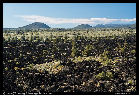 Homestead Flow and volcanic buttes. Lava Beds National Monument, California, USA (color)
