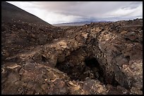 Pisgah Cinder cone and entrance to lava tube cave. Mojave Trails National Monument, California, USA ( color)