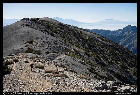 Hiker and trail on Mount Baldy. San Gabriel Mountains National Monument, California, USA (color)