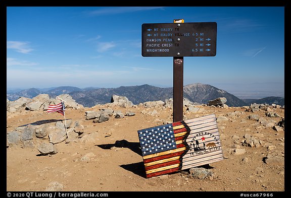 Sign and flags on Mt Baldy summit. San Gabriel Mountains National Monument, California, USA