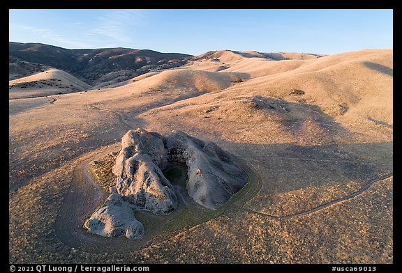 Aerial view of U-shaped rock outcrop named Painted Rock. Carrizo Plain National Monument, California, USA (color)