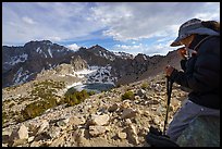 Hiker pauses above Big Pothole Lake, Inyo National Forest. California, USA ( color)