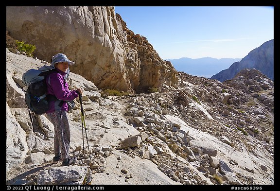 Backpacker on trail to Mt Whitney, Inyo National Forest. California