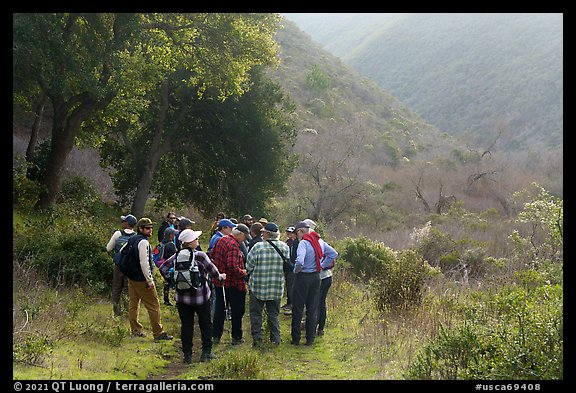 Group in canyon during ranger-led hike. Cotoni-Coast Dairies Unit, California Coastal National Monument, California, USA (color)