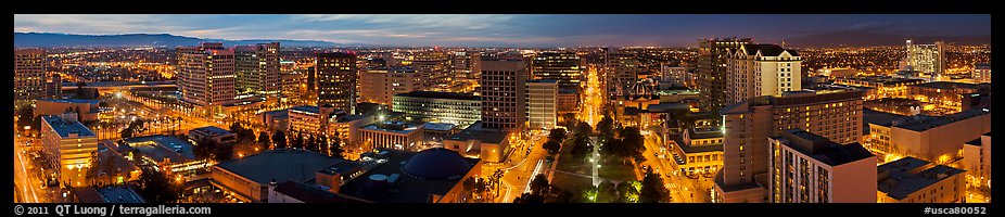 Downtown San Jose skyline and Cesar de Chavez Park at dusk. San Jose, California, USA
