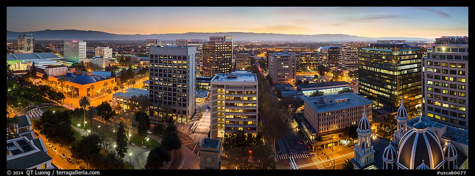 Downtown San Jose skyline and Santa Cruz Mountains at dusk. San Jose, California, USA